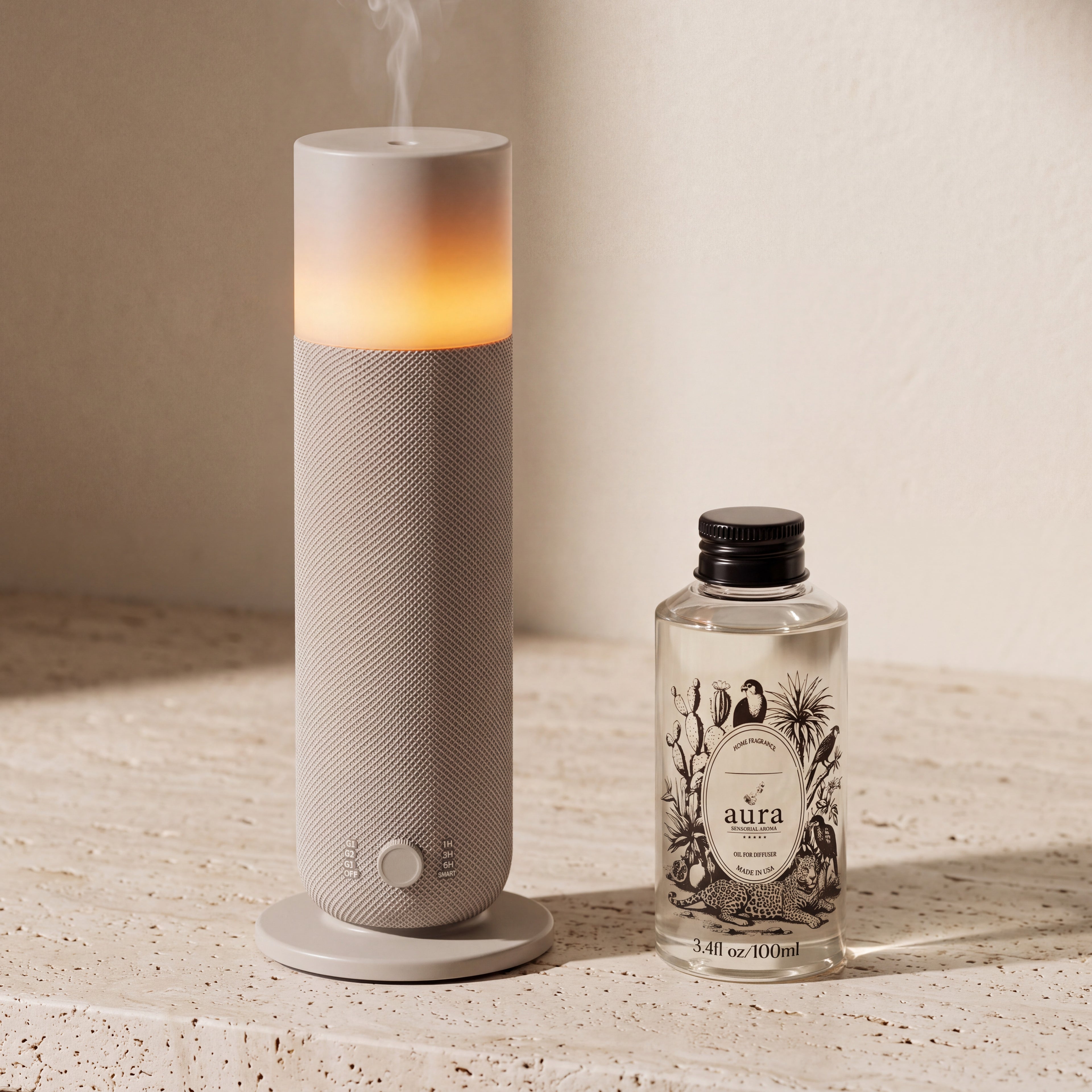 AURA Lumière beside the 100 ml Aura fragrance oil bottle