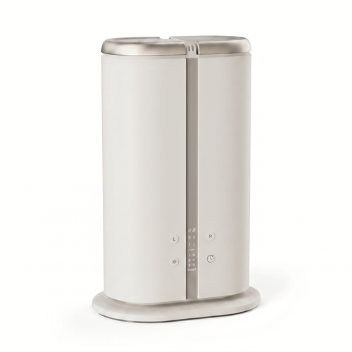 AURA Duetto dual-mist diffuser in ivory — studio packshot on white
