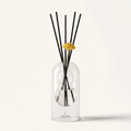 Corsica reed diffuser - glass bottle with rattan reeds, product packshot