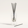 Marseille reed diffuser - glass bottle with rattan reeds, product packshot