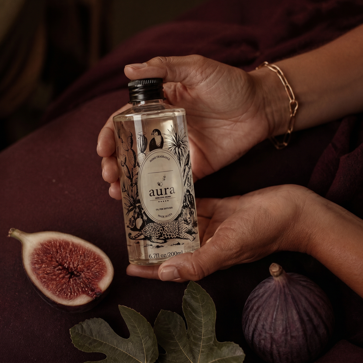 AURA Monaco fragrance oil 200 mL — styled scene 2