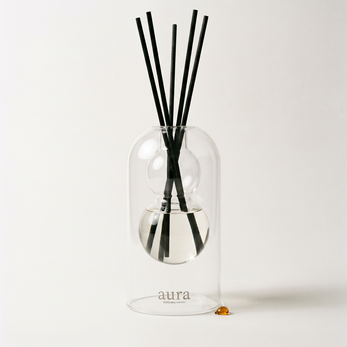 Monaco reed diffuser - glass bottle with rattan reeds, product packshot