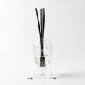 Provence reed diffuser - glass bottle with rattan reeds, product packshot