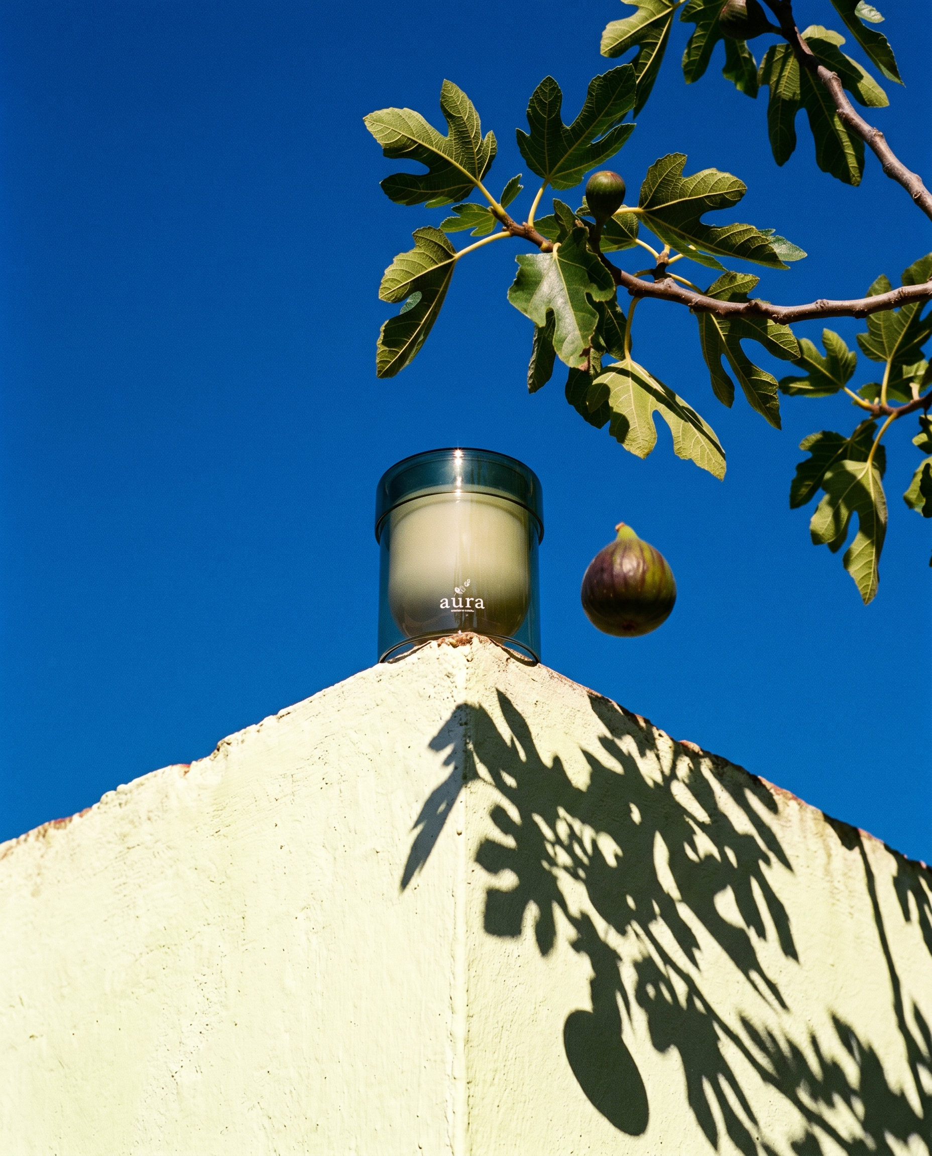 Capri scented candle lit - Italian editorial still life