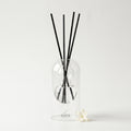 Sicilia reed diffuser - glass bottle with rattan reeds, product packshot