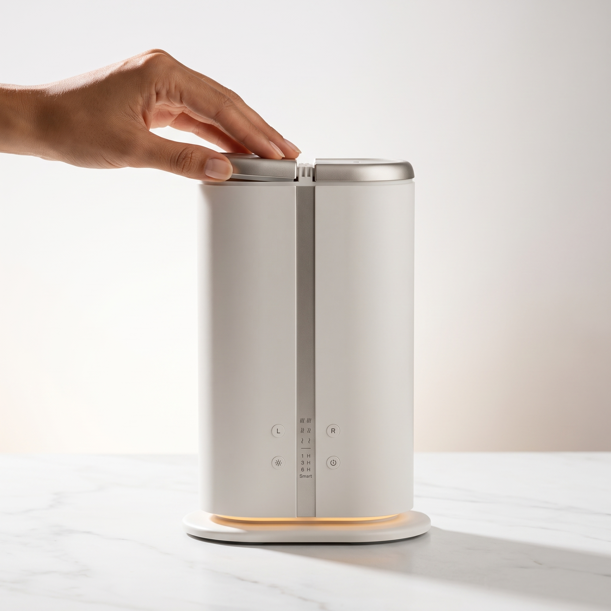 Hand opening the AURA Duetto to refill one of the two tanks